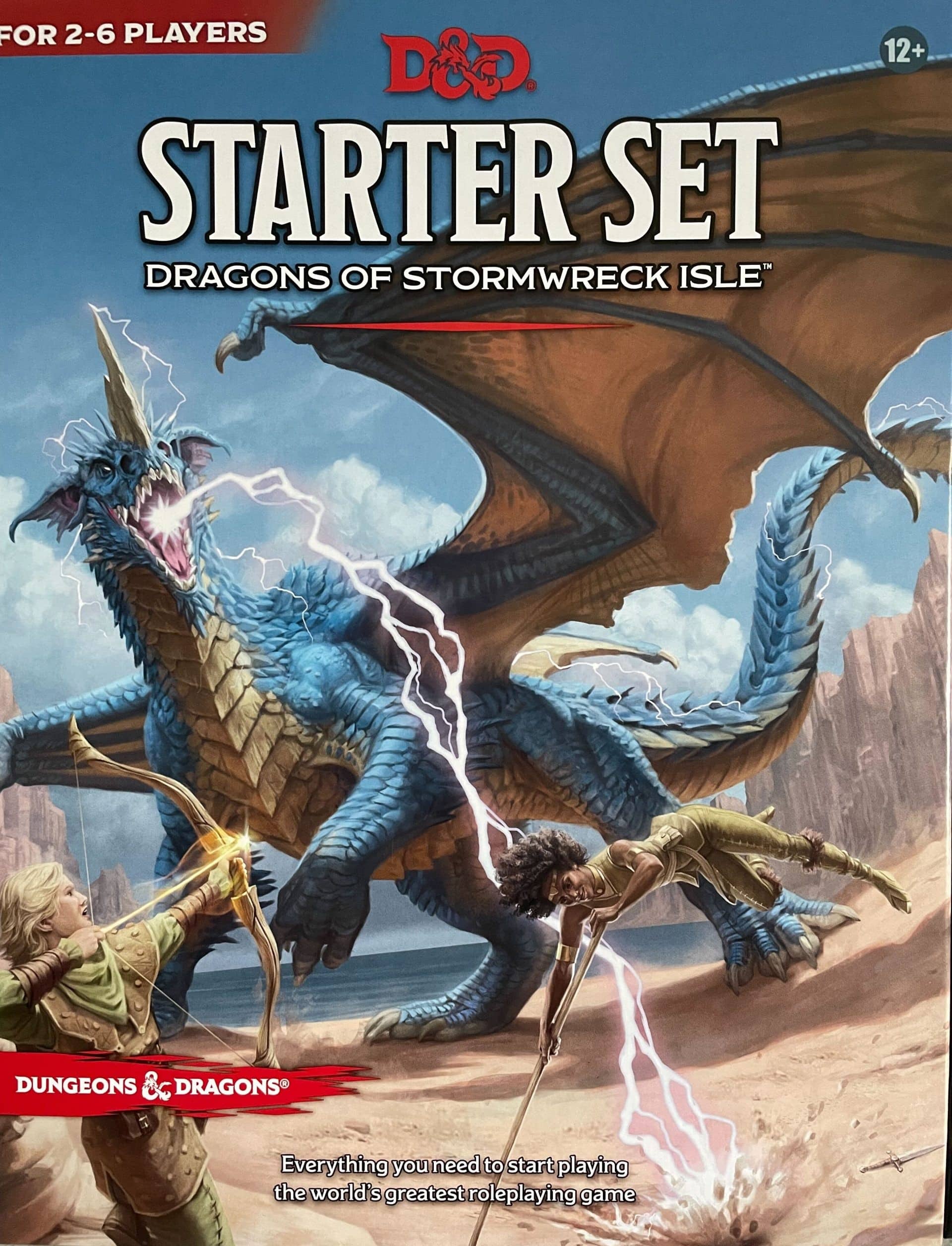 Dungeons & Dragons Startpakke Dragons of Stormwreck Isle omslag med helter og blå drage